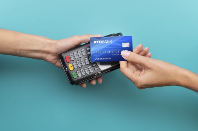 person-paying-with-its-credit-card