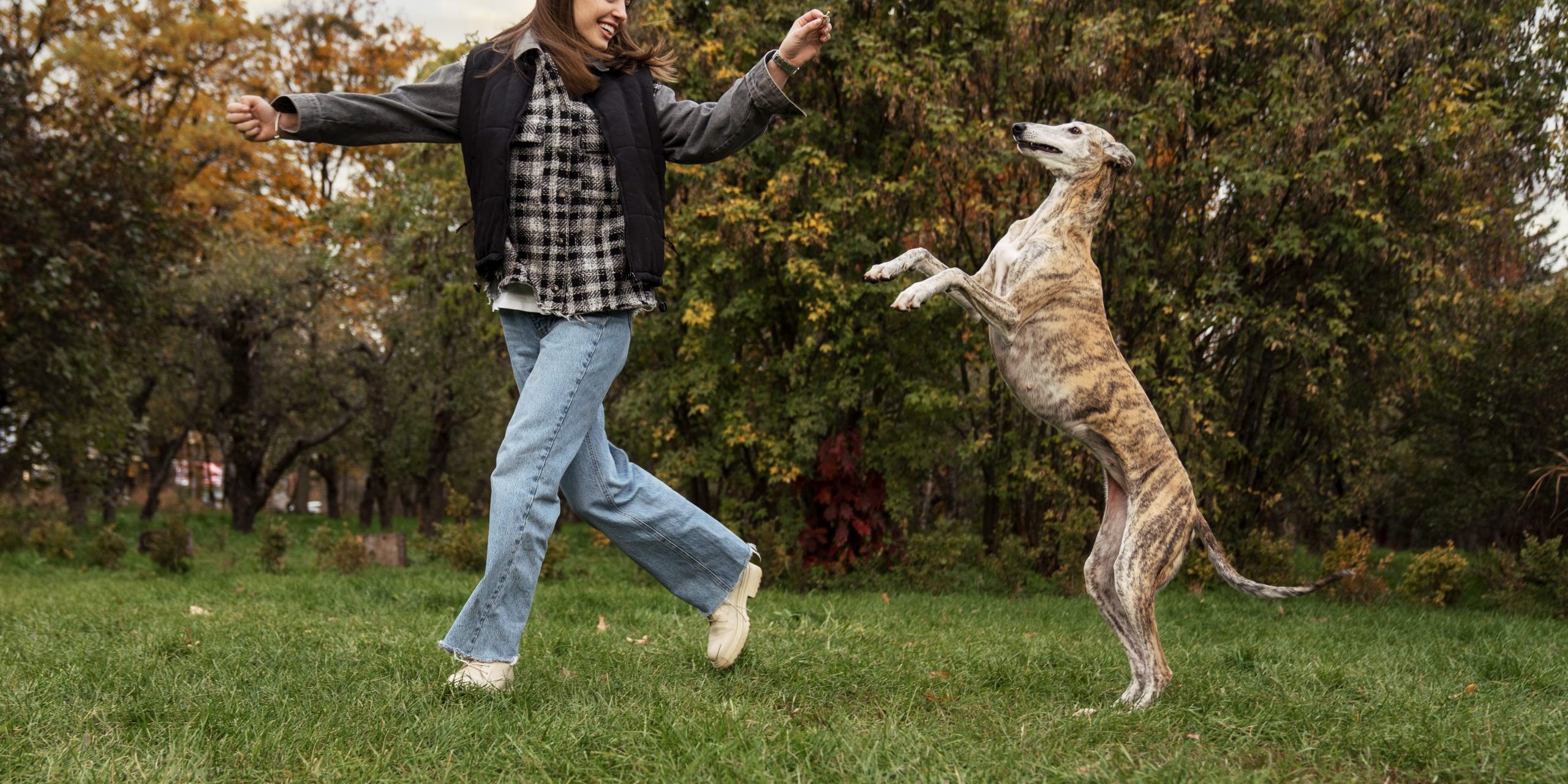 full-shot-woman-dog-running-outdoors