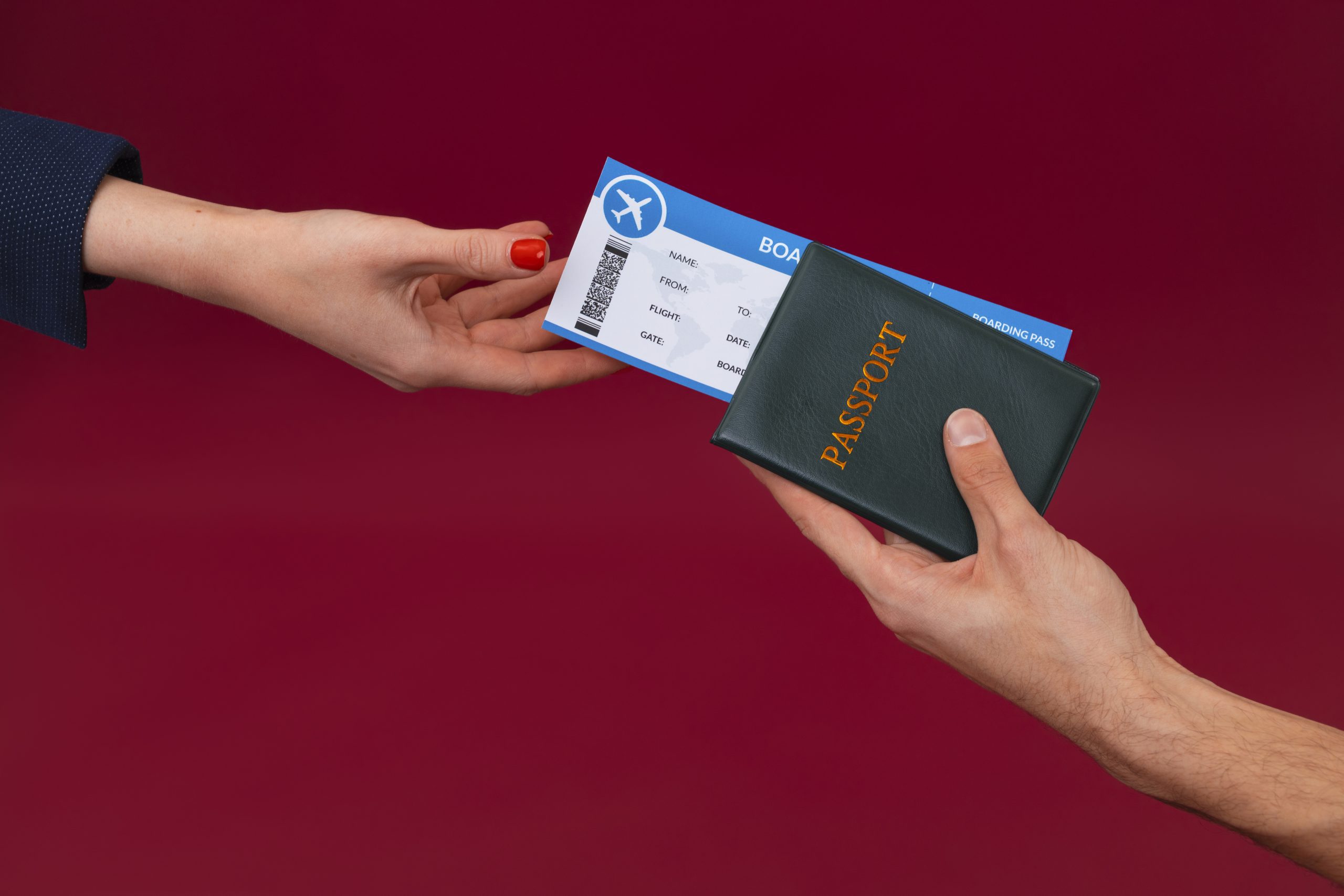 side-view-hands-holding-passport