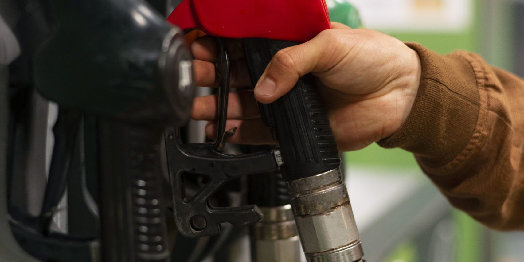 side-view-man-gas-station