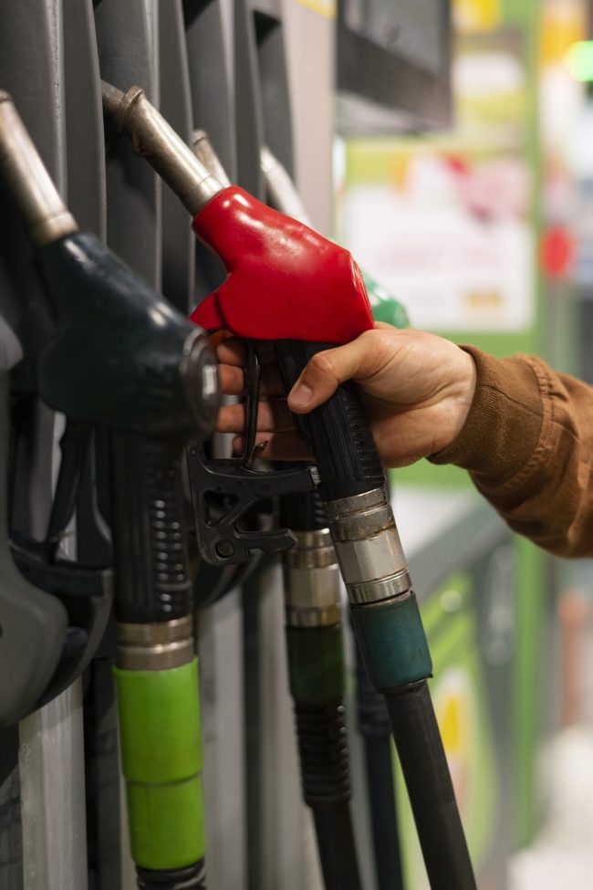 side-view-man-gas-station