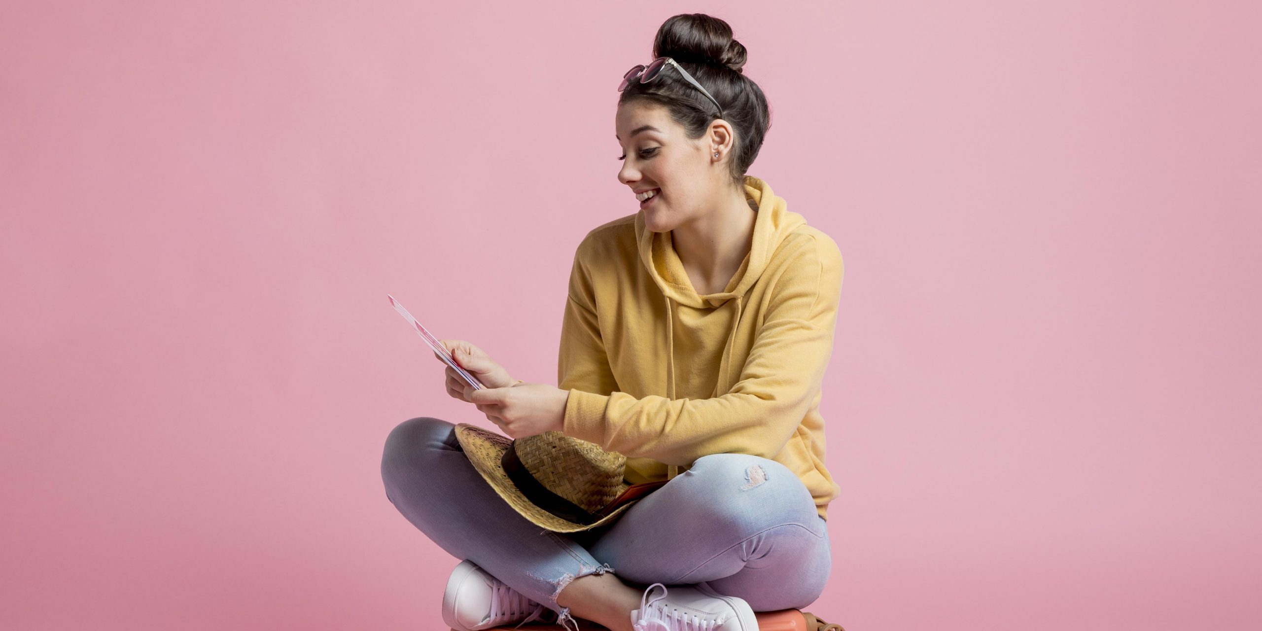 woman-looking-her-plane-tickets