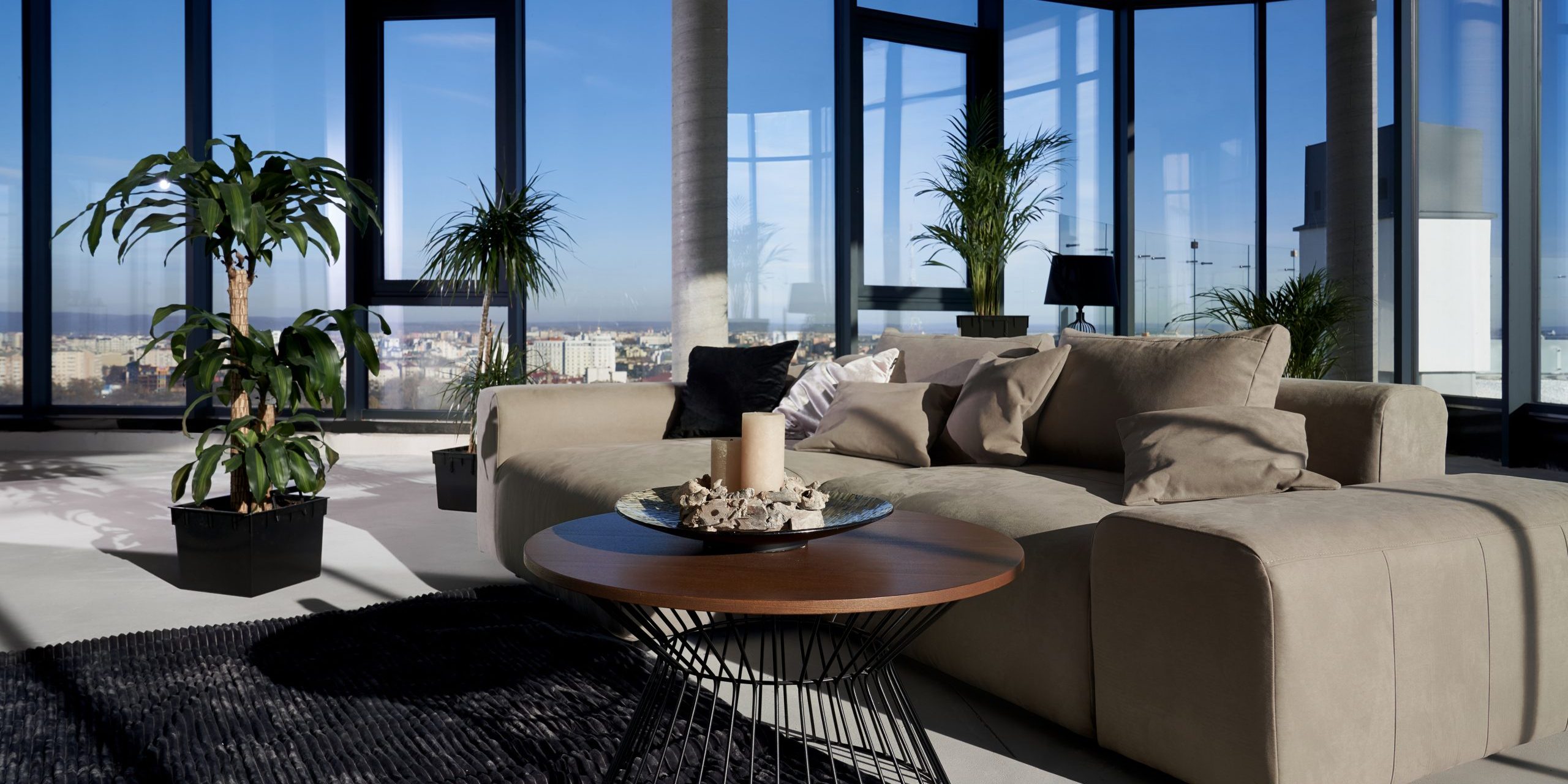 Modern spacious room with large panoramic window.